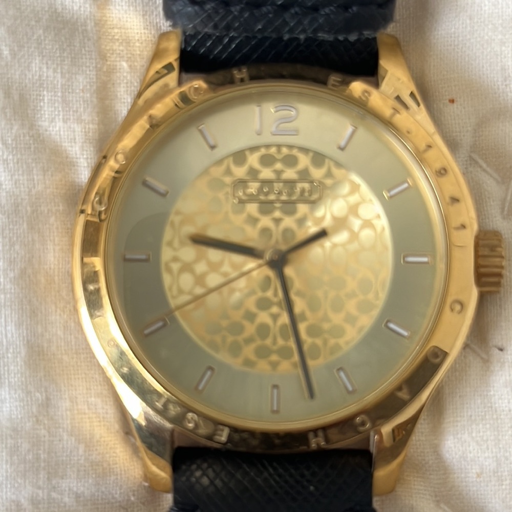 Pre-owned Like new ladies Coach watch. Black Leather band. Needs battery*